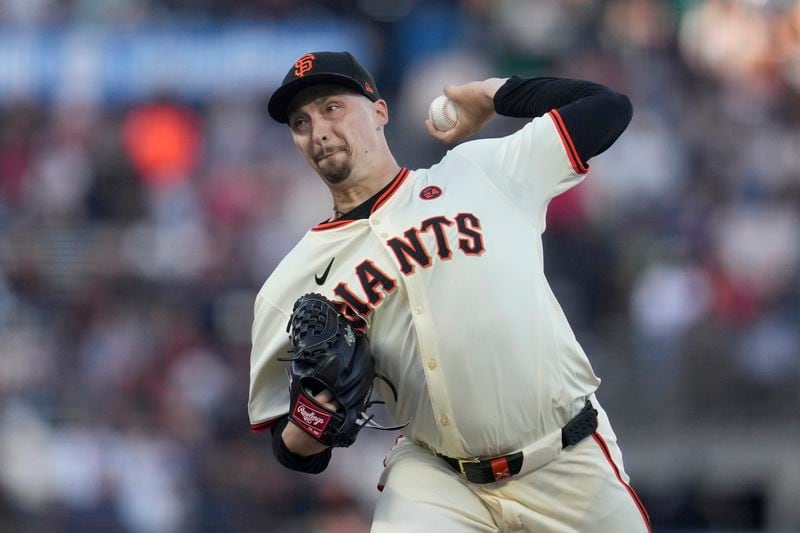 San Francisco Giants pitcher Blake Snell works against the Atlanta Braves during the first inning of a baseball game in San Francisco, Monday, Aug. 12, 2024. (AP Photo/Jeff Chiu)