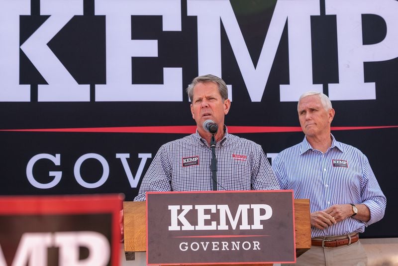 Gov. Brian Kemp, left, is particularly close with former Vice President Mike Pence, who is expected to run in 2024 for the White House. Kemp is viewed as a potential running mate for any Republican candidate outside of Donald Trump. (Arvin Temkar/Atlanta Journal-Constitution/TNS)
