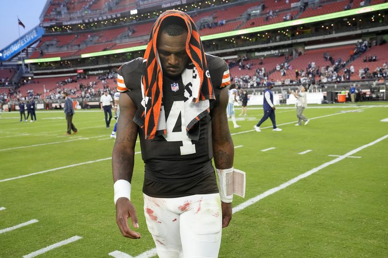 Cleveland Browns' Deshaun Watson walks off the field after an NFL football game against the Dallas Cowboys in Cleveland, Sunday, Sept. 8, 2024. (AP Photo/Sue Ogrocki)