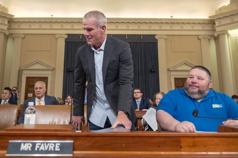 Former NFL quarterback Brett Favre arrives to appear before the House Committee on Ways and Means on Capitol Hill, Tuesday, Sept. 24, 2024, in Washington. (AP Photo/Mark Schiefelbein)