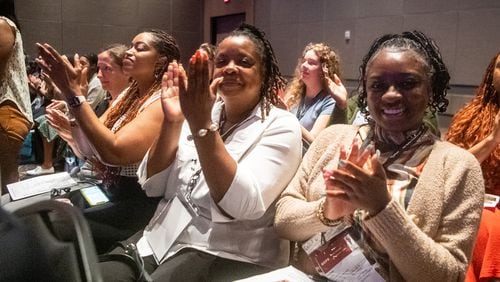 Audience members applaud during Gwinnett County Public Schools' new teacher orientation in Duluth on Thursday, July 18, 2024. (Ziyu Julian Zhu / AJC)