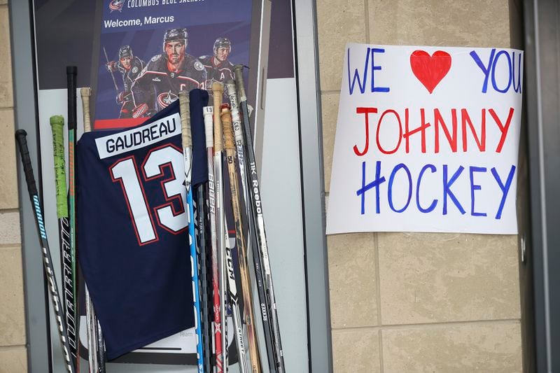 A memorial is set up by fans for Blue Jackets hockey player Johnny Gaudreau in Columbus, Ohio, Aug. 30, 2024. Gaudreau, along with his brother Matthew, was fatally struck by a motorist while riding his bicycle on Thursday. (AP Photo/Joe Maiorana)