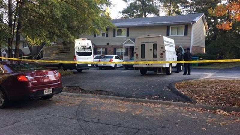 Gwinnett County police found two men shot to death inside a Norcross home Saturday morning.