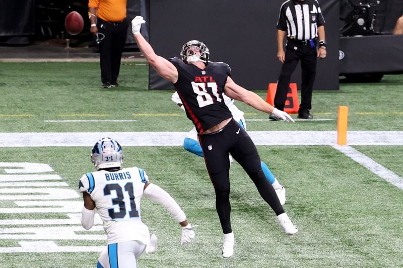 Falcons tight end Hayden Hurst (81) is unable to pull down a Matt Ryan pass in the end zone during the fourth quarter of a 23-16 loss to the Carolina Panthers Saturday, Oct. 11, 2020, at Mercedes-Benz Stadium in Atlanta. (Jason Getz/For the AJC)