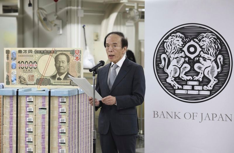 Bank of Japan Governor Kazuo Ueda delivers a speech during a ceremony to unveil new banknotes at the BOJ headquarters in Tokyo, Japan, Wednesday, July 3, 2024. (Japan Pool/Kyodo News via AP)