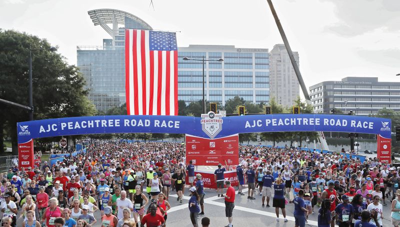 7/4/18 - Atlanta - Non elite runners at the starting line. The 49th running of the AJC Peachtree Road Race in Atlanta took off on Peachtree Street near Lenox Mall.  BOB ANDRES /BANDRES@AJC.COM