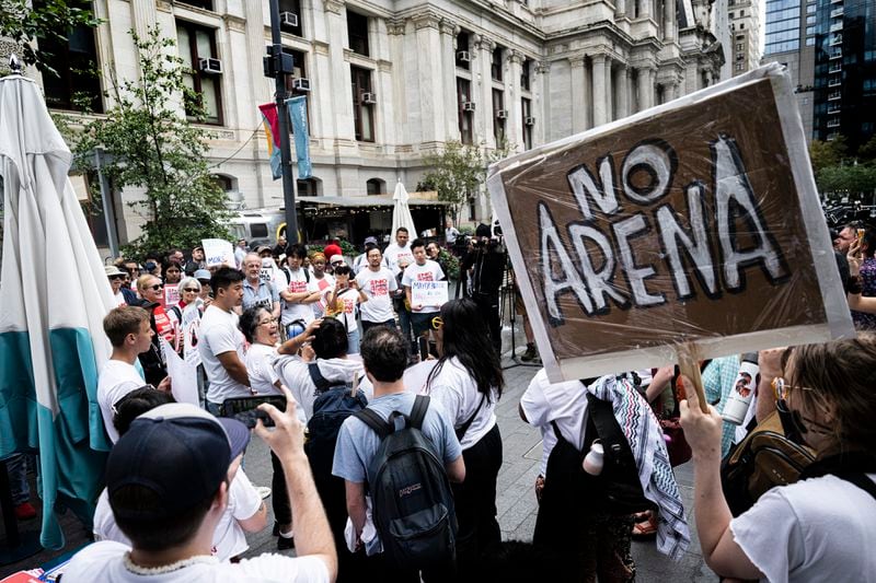 Supporters and Chinatown community leaders gather during a "No Sixers arena rally" on Wednesday, Sept. 18, 2024, outside Philadelphia City Hall in Philadelphia. (Jose F. Moreno/The Philadelphia Inquirer via AP)