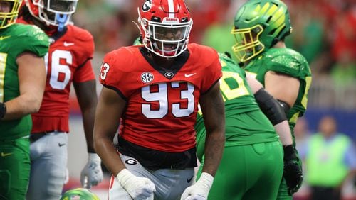 Georgia Bulldogs defensive lineman Tyrion Ingram-Dawkins (93) celebrates a defensive play during the second quarter against the Oregon Ducks in the Chick-fil-A Kickoff game at Mercedes Benz Stadium, Saturday, September 3, 2022, in Atlanta. (Jason Getz / Jason.Getz@ajc.com)