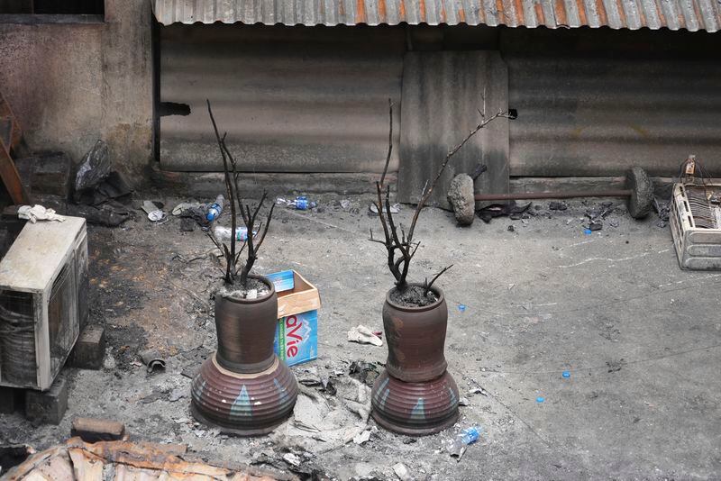 This photo shows the aftermath of a fire at a small apartment building in Hanoi, Vietnam Friday, May 24, 2024. State media said the overnight fire has killed a number of people and injured several others. (AP Photo/Hau Dinh)