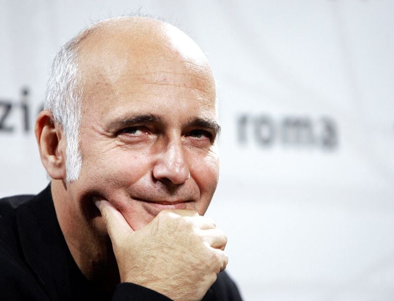 Italian music composer Ludovico Einaudi poses during a photocall to present his movie "This is England", by British director Shane Meadows, for the first-ever edition of the Rome Film Festival, at Rome's Auditorium, Wednesday,  Oct. 18, 2006. (AP Photo/Andrew Medichini)