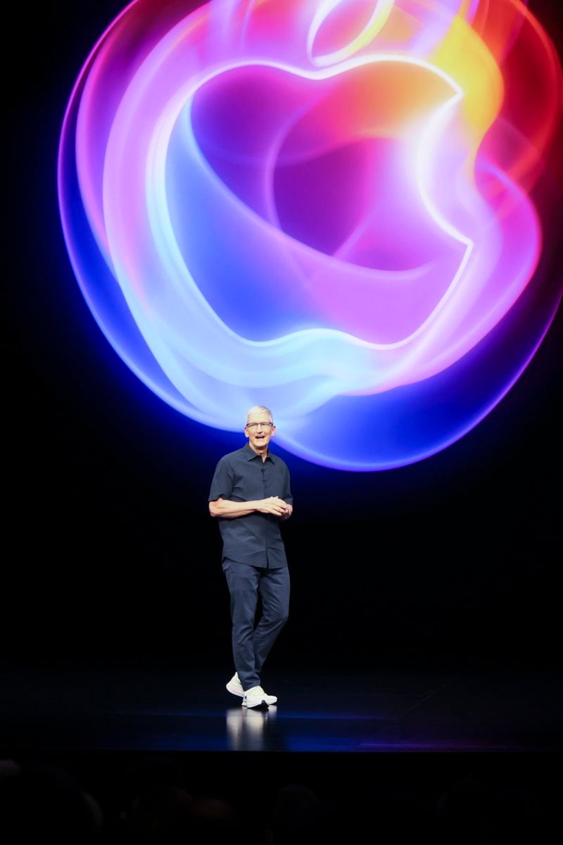 Apple CEO Tim Cook talks on the stage during an announcement of new products at Apple headquarters Monday, Sept. 9, 2024, in Cupertino, Calif. (AP Photo/Juliana Yamada)