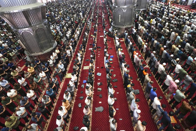 Muslim men perform Friday prayer at Istiqlal Mosque in Jakarta, Indonesia, Friday, Aug. 9, 2024. (AP Photo/Tatan Syuflana)