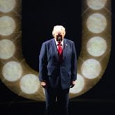 Former president Donald Trump walks onto the stage to accept the Republican presidential nomination at Fiserv Form in Milwaukee on Thursday, July 18, 2024, the fourth day of the Republican National Convention (Arvin Temkar / AJC)