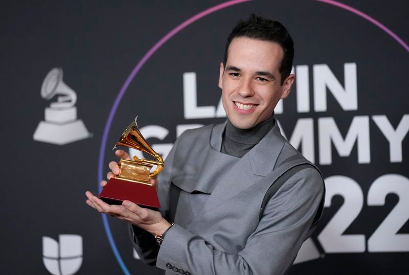 FILE - Edgar Barrera poses with a Grammy at the 23rd annual Latin Grammy Awards on Nov. 17, 2022, in Las Vegas. (AP Photo/John Locher, File)