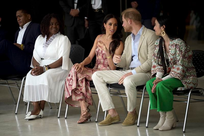 Prince Harry and Meghan attend a welcoming ceremony, at the Delia Zapata National Arts Center, flanked by Colombia's Vice President Francia Márquez, left, and director Xiomara Suescun, in Bogota, Colombia, Thursday, Aug. 15, 2024. (AP Photo/Ivan Valencia)