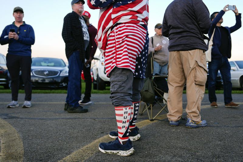 Supporters of Republican presidential nominee former President Donald Trump wait to enter a campaign rally at the Butler Farm Show, Saturday, Oct. 5, 2024, in Butler, Pa. (AP Photo/Julia Demaree Nikhinson)