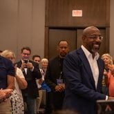 U.S. Sen. Raphael Warnock, who was a guest on a live edition of "Politically Georgia" in Savannah, said  his faith as a senior pastor at Ebenezer Baptist Church in Atlanta helps shape his approach to issues such as health care access. (AJC Photo/Katelyn Myrick)