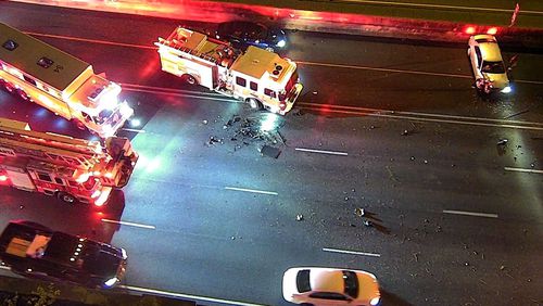 One person died early Sunday after the vehicle they were driving rolled over a barrier wall on the Buford Spring Connector and crashed onto the I-75 North expressway below, according to Atlanta police.