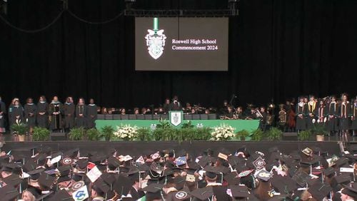 Roswell High School graduates prepare for their next chapter after receiving their diplomas. What do students need to get to this happy moment? (Courtesy of Fulton County Schools)