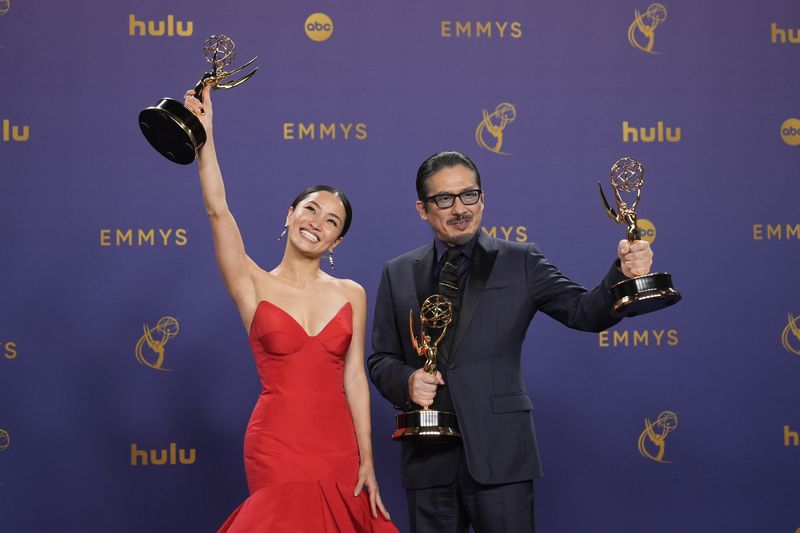 Anna Sawai, left, winner of the award for outstanding lead actress in a drama series for "Shogun", and Hiroyuki Sanada, winner of the awards for outstanding lead actor in a drama series, and outstanding drama series for "Shogun" pose in the press room during the 76th Primetime Emmy Awards on Sunday, Sept. 15, 2024, at the Peacock Theater in Los Angeles. (AP Photo/Jae C. Hong)