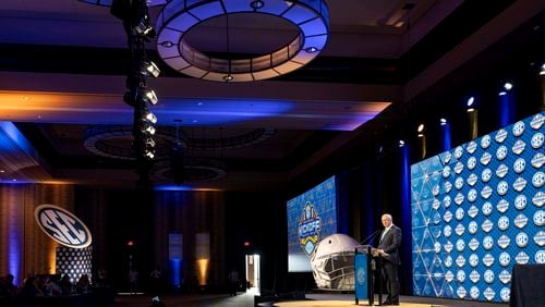 Southeastern Conference commissioner Greg Sankey gives an opening address during the SEC NCAA college football media days Monday, July 15, 2024, in Dallas. (AP Photo/Jeffrey McWhorter)