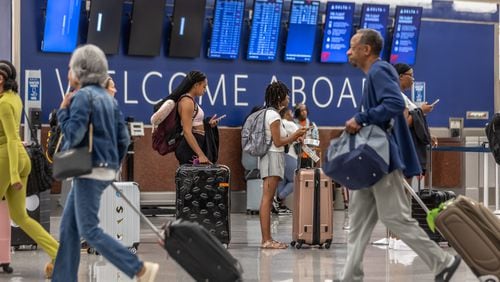 Travelers at Delta ticket counters at Hartsfield-Jackson International Airport on Friday, July 19, 2024 as a massive CrowdStrike outage affected Microsoft users around the globe. (John Spink/AJC)