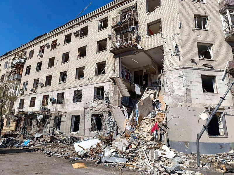 In this photo provided by the Ukrainian Emergency Service, a damaged apartment house is seen after it was hit by Russian air bomb killing at least three and injuring 23, in Kharkiv, Ukraine, Saturday, June 22, 2024. (Ukrainian Emergency Service via AP)