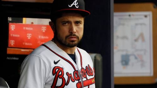 Braves catcher Travis d'Arnaud (16) look on during the third inning against the Diamondbacks at Truist Park Tuesday, July 18, 2023, in Atlanta. d’Arnold agrees to an $8M contract for 2024 with an option for 2025.Miguel Martinez / miguel.martinezjimenez@ajc.com