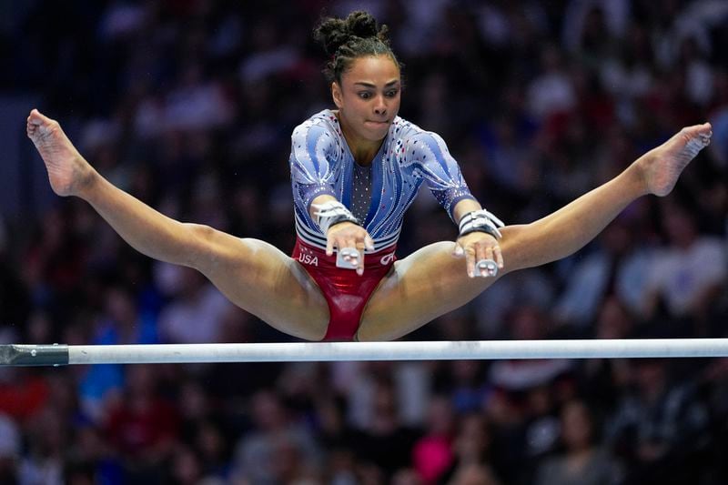 Hezly Rivera competes on the uneven bars at the United States Gymnastics Olympic Trials on Sunday, June 30, 2024, in Minneapolis. (AP Photo/Abbie Parr)