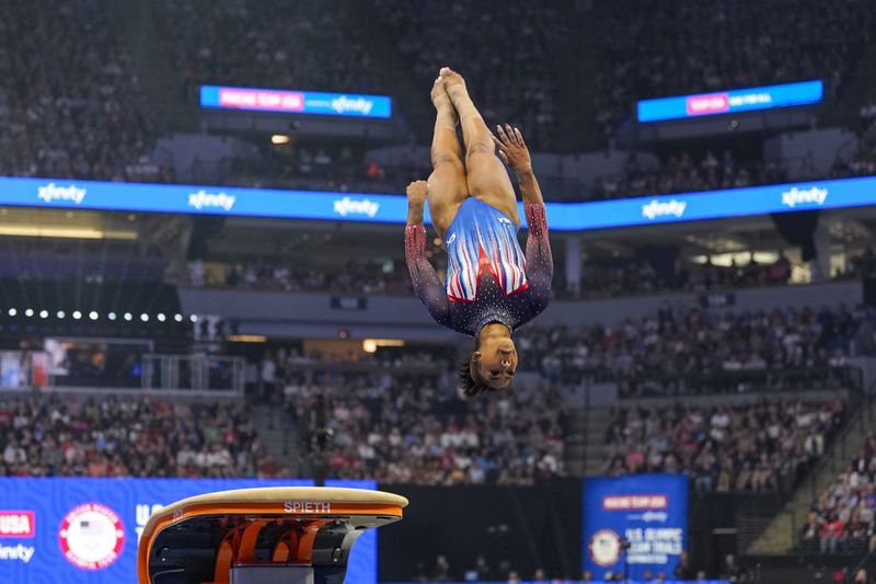 Jordan Chiles competes on the vault at the United States Gymnastics Olympic Trials on Sunday, June 30, 2024, in Minneapolis. (AP Photo/Abbie Parr)