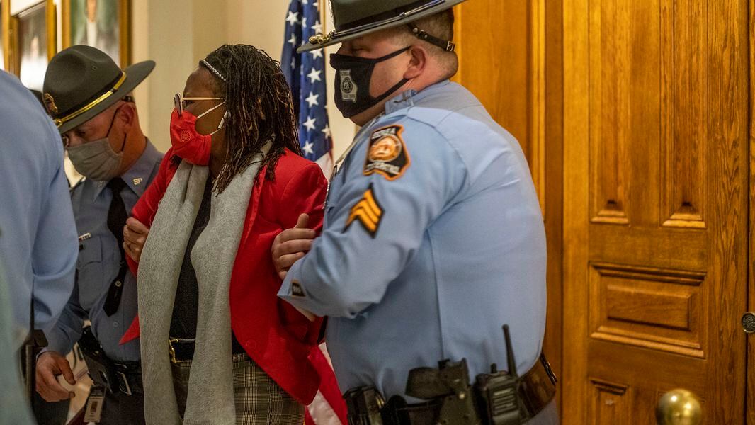 Police arrest Georgia Democratic lawmaker outside governor's office during  protest of election bill