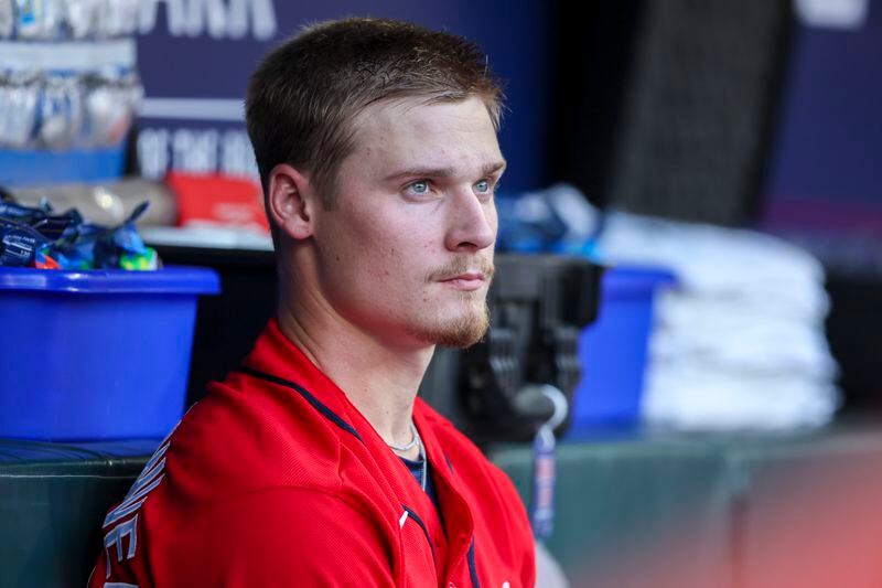 Atlanta Braves starting pitcher AJ Smith-Shawver watches from the dugout as the Braves bat during the first inning against the Washington Nationals at Truist Park, Friday, June 9, 2023, in Atlanta. This is Smith-Shawver’s first MLB start. (Jason Getz / Jason.Getz@ajc.com)