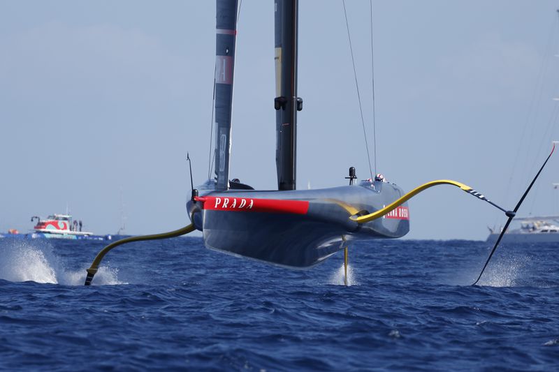 Luna Rosa Prada Pirelli sailing team competes during the Louis Vuitton Cup Final Day 7 at the Barcelona's coast, Spain, Friday, Oct. 4, 2024. (AP Photo/Joan Monfort)