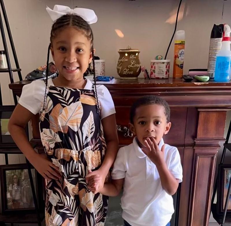 Harmony Taylor, 7, and her 4-year-old brother, Derrick, in a family photograph.