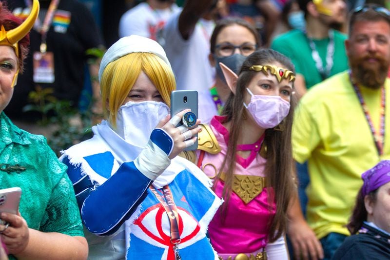 People line Peachtree Street to watch the Dragon Con Parade on Saturday, September 4, 2021, in Atlanta. STEVE SCHAEFER FOR THE ATLANTA JOURNAL-CONSTITUTION