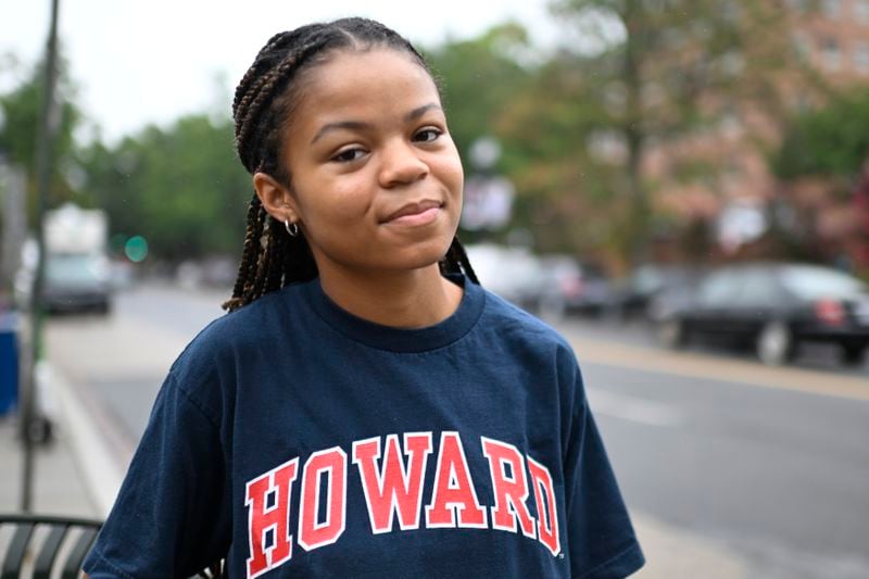 Howard University student Nikkya Taliaferro poses for a portrait across the street from her school, Friday, Aug. 30, 2024 in Washington. (AP Photo/John McDonnell)