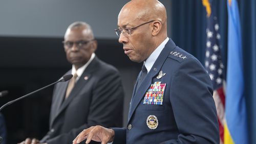 FILE - Chairman of the Joint Chiefs of Staff Gen. CQ Brown Jr., speaks during a press briefing with Defense Secretary Lloyd Austin, left, April 26, 2024 at the Pentagon in Washington. (AP Photo/Kevin Wolf)