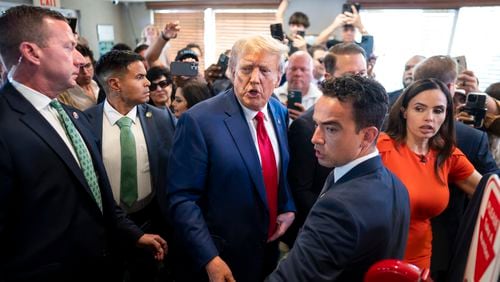 
                        Former President Donald Trump stops at the Versailles restaurant following his arraignment, in the Little Havana neighborhood of Miami, on June 13, 2023. Trump is expected to continue with a fairly steady stream of political events in the coming months. (Doug Mills/The New York Times)
                      