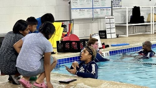 Marcela Cruz-Baltazar and her three kids at the Oakhurst Pool on August 4, 2024. (Photo Courtesy of Daniela Cintron)