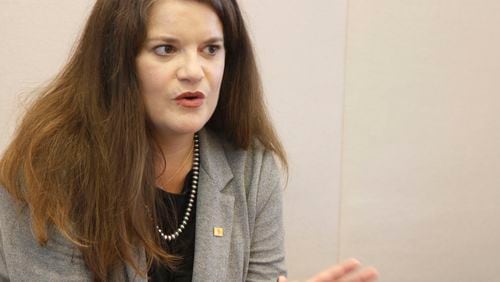 FILE - New Mexico Secretary of State Maggie Toulouse Oliver speaks during a news briefing, Oct. 19, 2022, in Santa Fe, N.M. (AP Photo/Morgan Lee, File)