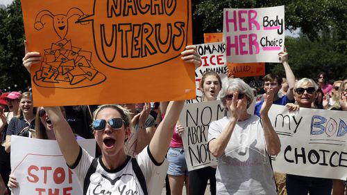 FILE - A group gathers to protest abortion restrictions at the State Capitol in Austin, Texas, Tuesday, May 21, 2019. (AP Photo/Eric Gay, File)