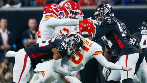 Atlanta Falcons linebacker Kaden Elliss (55) sacks Kansas City Chiefs quarterback Patrick Mahomes (15) as he throws for an interception during the first half on Sunday, Sept. 22, 2024, at Mercedes-Benz Stadium in Atlanta. 
(Miguel Martinez/ AJC)