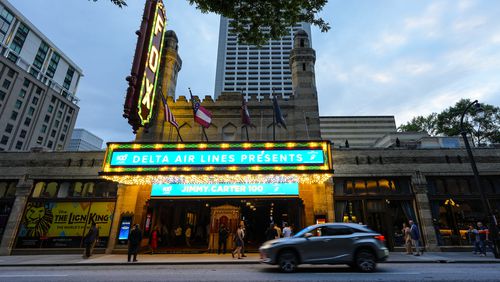 People wait in line ahead of a "Jimmy Carter 100: A Celebration in Song," concert at the Fox Theatre, Tuesday, Sept. 17, 2024, in Atlanta. Former President Carter turns 100-years old on Oct. 1. (AP Photo/Mike Stewart)