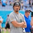 Green Bay Packers' Jordan Love watches before an NFL football game against the Tennessee Titans Sunday, Sept. 22, 2024, in Nashville, Tenn. (AP Photo/George Walker IV)