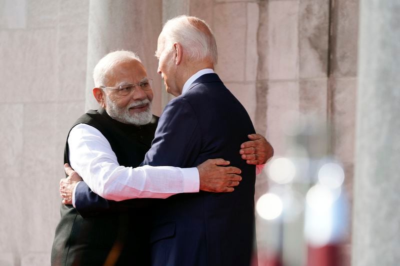 President Joe Biden greets India's Prime Minister Narendra Modi at the Quad leaders summit at Archmere Academy in Claymont, Del., Saturday, Sept. 21, 2024. (AP Photo/Mark Schiefelbein)