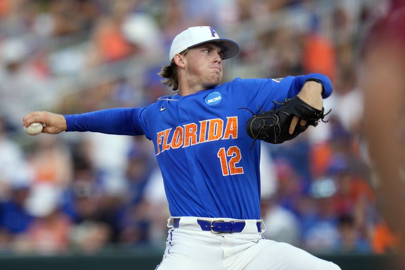 Florida pitcher Hurston Waldrep (12) throws against South Carolina in the first inning of an NCAA college baseball tournament super regional game Saturday, June 10, 2023, in Gainesville, Fla. (AP Photo/John Raoux)