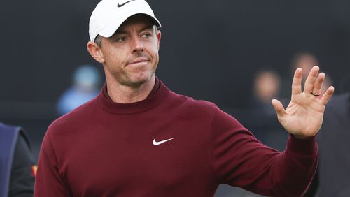 Rory McIlroy of Northern Ireland waves as he walks off the 18th green following his second round of the British Open Golf Championships at Royal Troon golf club in Troon, Scotland, Friday, July 19, 2024. (AP Photo/Scott Heppell)