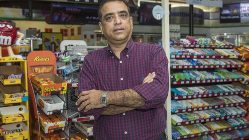 Shell gas station owner Suhel Kazani stands for a photo at his Snellville station Monday, April 6, 2020. Kazani owns seven Shell stations in metro Atlanta. Because of the coronavirus pandemic, his gasoline sales are way down, he said. (ALYSSA POINTER / ALYSSA.POINTER@AJC.COM)