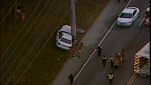 A woman and a fourth-grade boy were hit by a car Thursday morning while waiting for a DeKalb County school bus. (Credit: Channel 2 Action News)