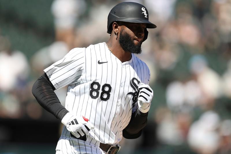 Chicago White Sox's Luis Robert Jr. looks on after hitting a home run during the first inning of a baseball game against the Atlanta Braves Thursday, June 27, 2024, in Chicago. (AP Photo/Melissa Tamez)